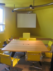 The yellow room at Vitra HQ in Basel with EA 108 from Charles and Ray Eames.