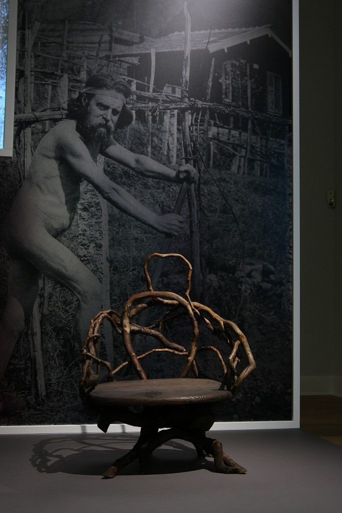 A chair by Karl Grässer, nd a nude man, as seen at Art Nouveau The Great Utopian Vision, the Museum für Kunst und Gewerbe Hamburg