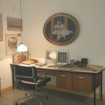Shrouded by the mists of time... and behind glass. Charles Eames' desk