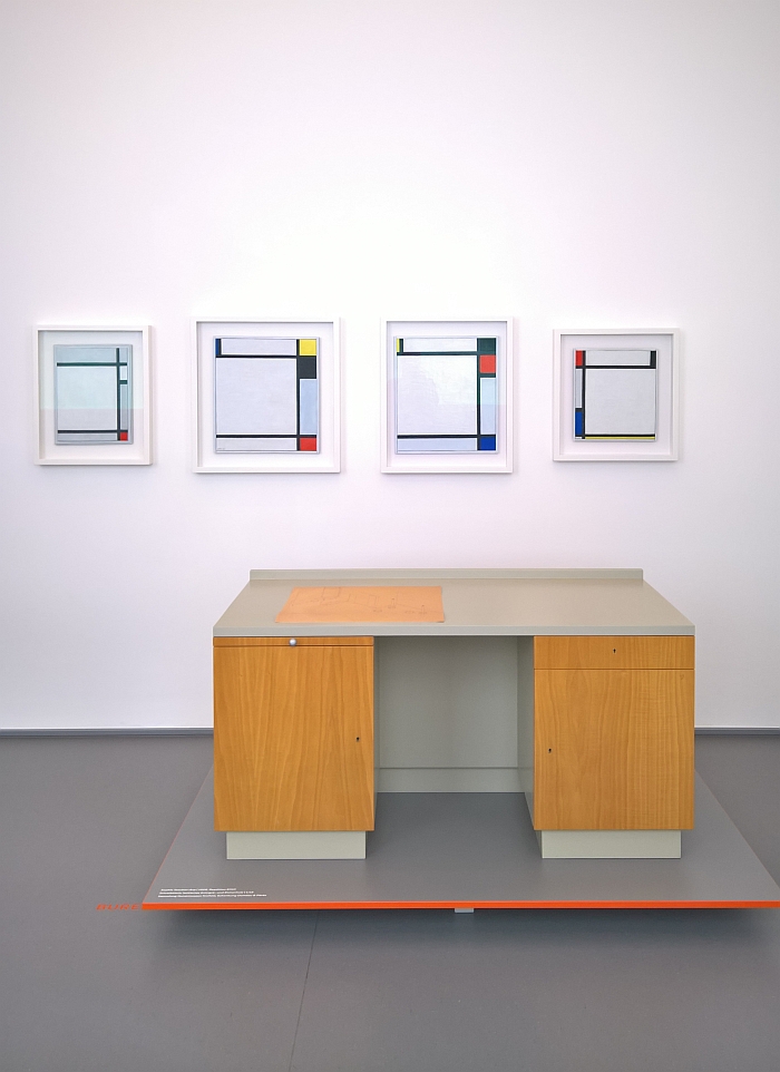 Bureau by Sophie Taeuber-Arp and works by Piet Mondrian, as seen at From Idea to Form. Domeau & Pérès Design and Craftsmanship in Dialogue, Kaiser Wilhelm Museum Krefeld
