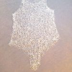 Serendipity by Anne Büscher, a bathing suite crafted from woven glass. No honest!