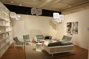 A fictional communal housing project lounge, as seen at Together. The new architecture of the collective the Grassi Museum für Angewandte Kunst Leipzig