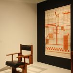 An anoymous chair and weaving by Else Mögelin in a recreation by Studio Aphorisma, as seen at Bauhaus_Sachsen, Grassi Museum für Angewandte Kunst Leipzig