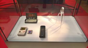 An Atari Portfolio (top), Game Boy + Tetris (l.) Philips AP 6112 mobile phone (m.) and a Juicy Salif citrus squeezer by Philippe Starck for Alessi, as seen at 1989 - Culture and Politics, The National Museum Stockholm