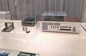 Works by Hans Gugelot including the Kodak Carousel S projector and nova Q 100 record player for Quelle, as seen at Hans Gugelot. The Architecture of Design, HfG-Archiv Ulm