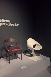 A 1902 Bruno Paul armchair and Colani’s 1968, fibregalss, Polycor chair for COR, as seen at Luigi Colani and Art Nouveau, Bröhan-Museum, Berlin