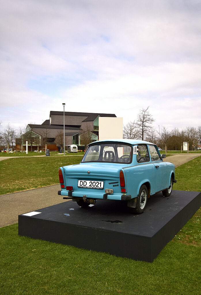 They'll want to change that number plate before presenting it in DD in October. A Trabant P601 in front of the VitraHaus, as seen at German Design 1949–1989. Two Countries, One History, Vitra Design Museum, Weil am Rhein