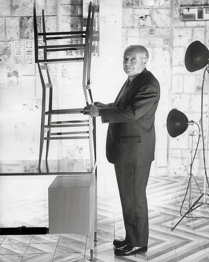 Gio Ponti, with two Superleggera chairs (Photo Dan Wynn © Gio Ponti Archives/Historical Archive of Ponti’s Heirs, courtesy Taschen Verlag)