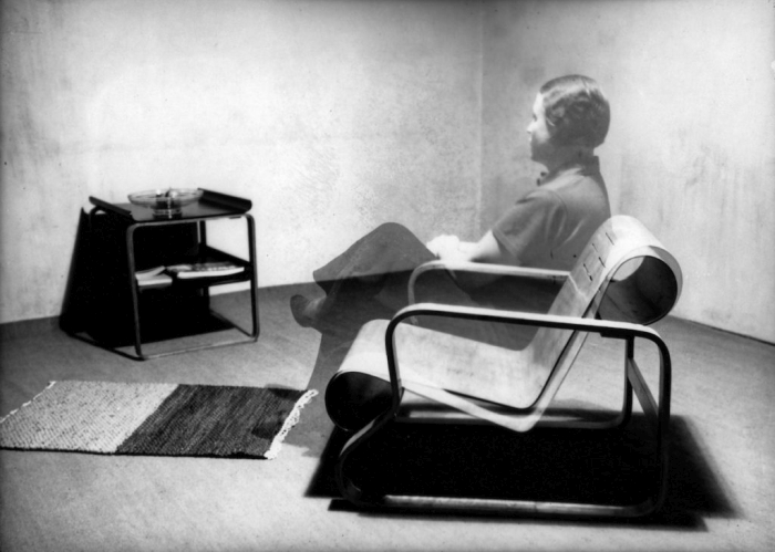 Aino Aalto in a Paimio Chair developed by the Aalto's for the Paimio Tuberculosis Sanatorium, part of Design and Healing Creative Responses to Epidemics at Cooper Hewitt, Smithsonian Design Museum (photo ca. 1932 © Alvar Aalto Foundation, courtesy Cooper Hewitt, Smithsonian Design Museum)
