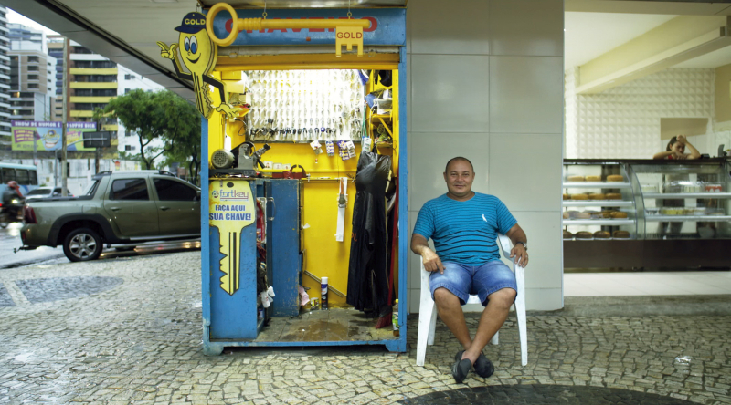 A key-cutter in Fortaleza, Brazil. On a monobloc. (Photo © Boris Mahlau / PIER 53, courtesy Hatje Cantz)