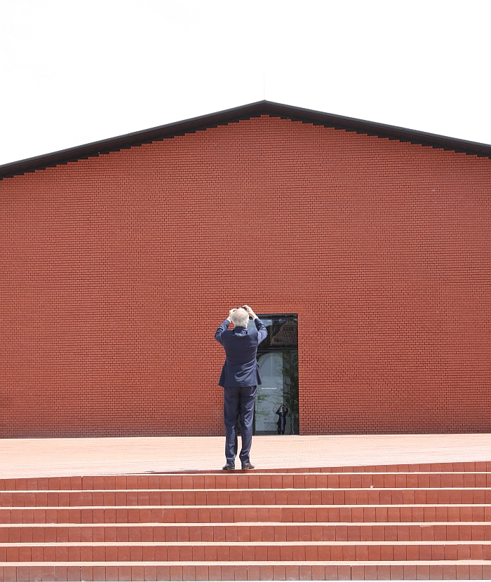 Pierre de Meuron taking an "architect's selfie" in front of the Vitra Design Museum Schaudepot, a project by Herzog & de Meuron (which may or may not feature in Herzog & de Meuron at the Royal Academy of Arts, London)