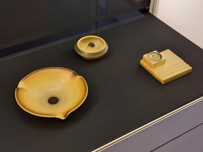 Two ashtrays and a desk tidy (r), as seen at Haël. Margarete Heymann-Loebenstein and her workshops for decorative ceramics 1923-1934, Bröhan Museum, Berlin 