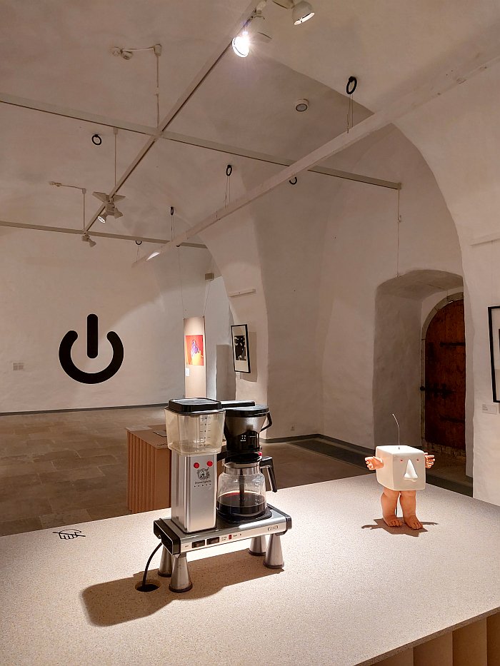 Douwe en Egbert by Eibert Draisma (Douwe left, Egbert right) and the 'Power' logo, as seen at Uneversum: Rhythms and Spaces, Estonian Museum of Applied Art and Design, Tallinn