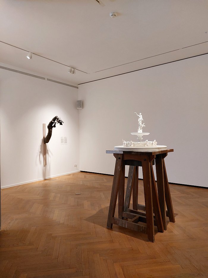 A plaster model of the Hygieia fountain in Hamburg and a 17th century bronze dragon waterspout from Japan, as seen at Water Pressure. Designing for the Future, Museum für Kunst und Gewerbe, Hamburg