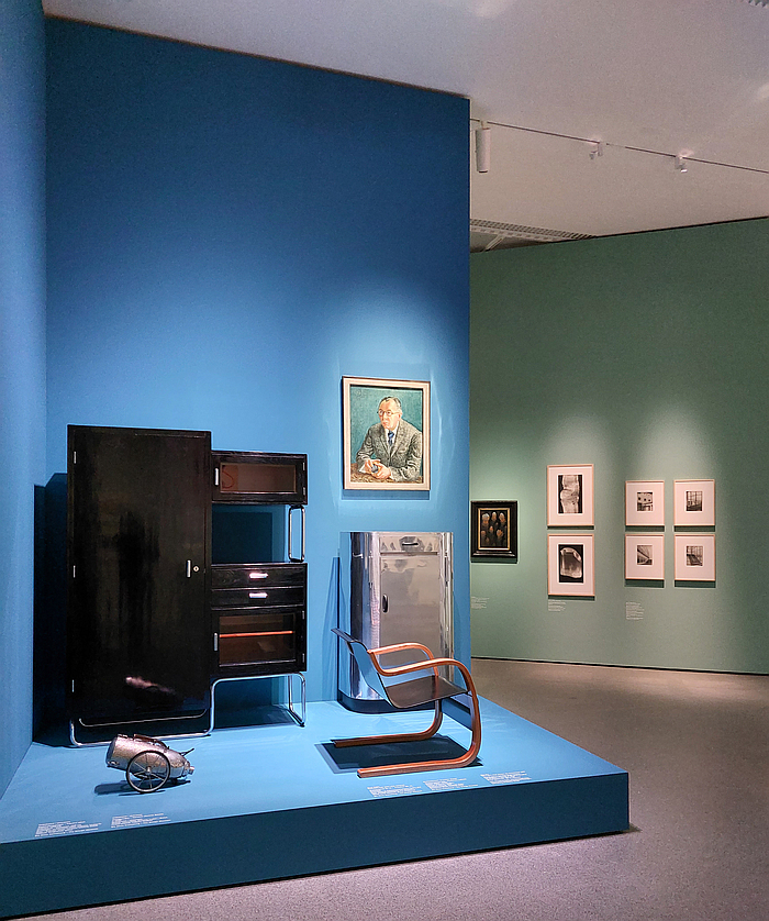 A ca. 1930 canon inspired vacuum cleaner, and Armchair No. 31 by Alvar (and Aino?) Aalto, amongst other works, as seen at 4 Museums – 1 Modernism, Pinakothek der Moderne, Munich