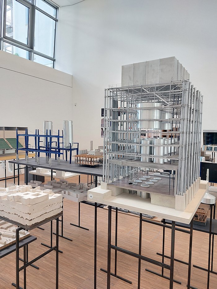 Wasser treatment plant by Pauline Ludwig and Katrin Schneyer (front) with Brauhaus by Louis Ostermeyer and leonard Weber (rear), as seen at Resource, Research, Reset - Transformation of Sacred Spaces, DG Kunstraum Diskurs Gegenwart during Munich Creative Business Week 2025 