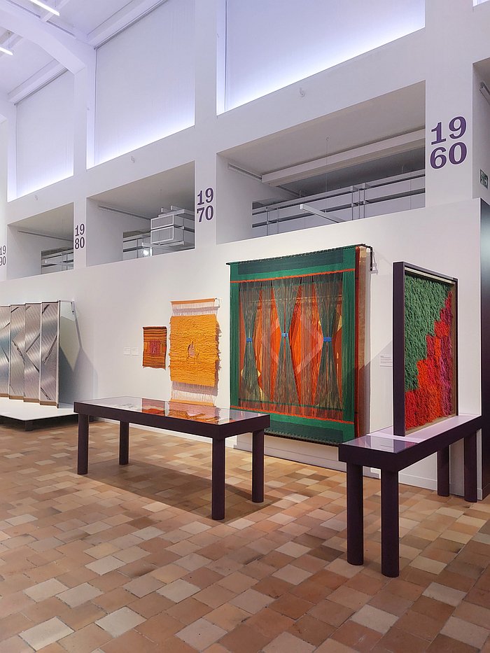 Theater - Hommage à Dürrenmatt by Elis Giauque and Käthi Wenger (centre), amongst other works, as seen at Textile Manifestos - From Bauhaus to Soft Sculpture, Museum für Gestaltung, Zürich