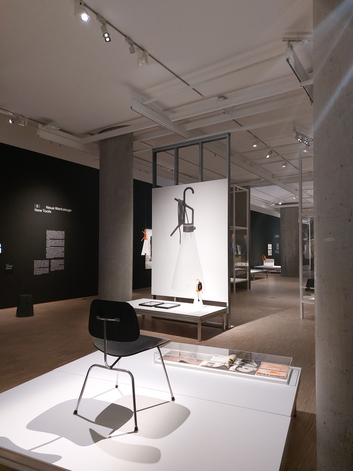 A DCM by Charles and Ray Eames says Hello to the Mayday lamp by Konstantin Grcic, as seen at Hello Image. The Staging of Things, Museum für Kunst und Gewerbe, Hamburg
