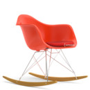 Eames Plastic Armchair RE RAR with Upholstery, Poppy Red, With seat upholstery, Coral / poppy red , Without border welting, Chrome/yellowish maple